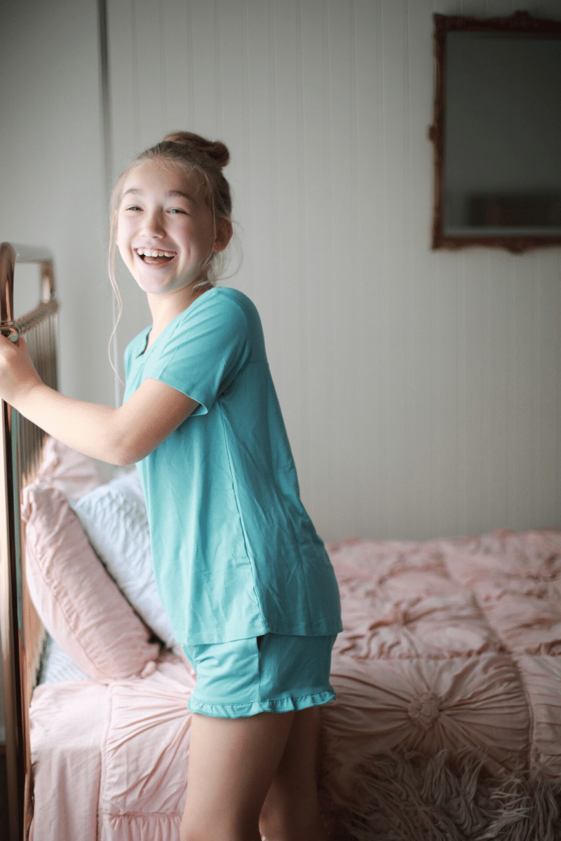 mint teen girls summer pyjamas set shorts with pockets and frill and short sleeve top by Love Haidee Australia side happy