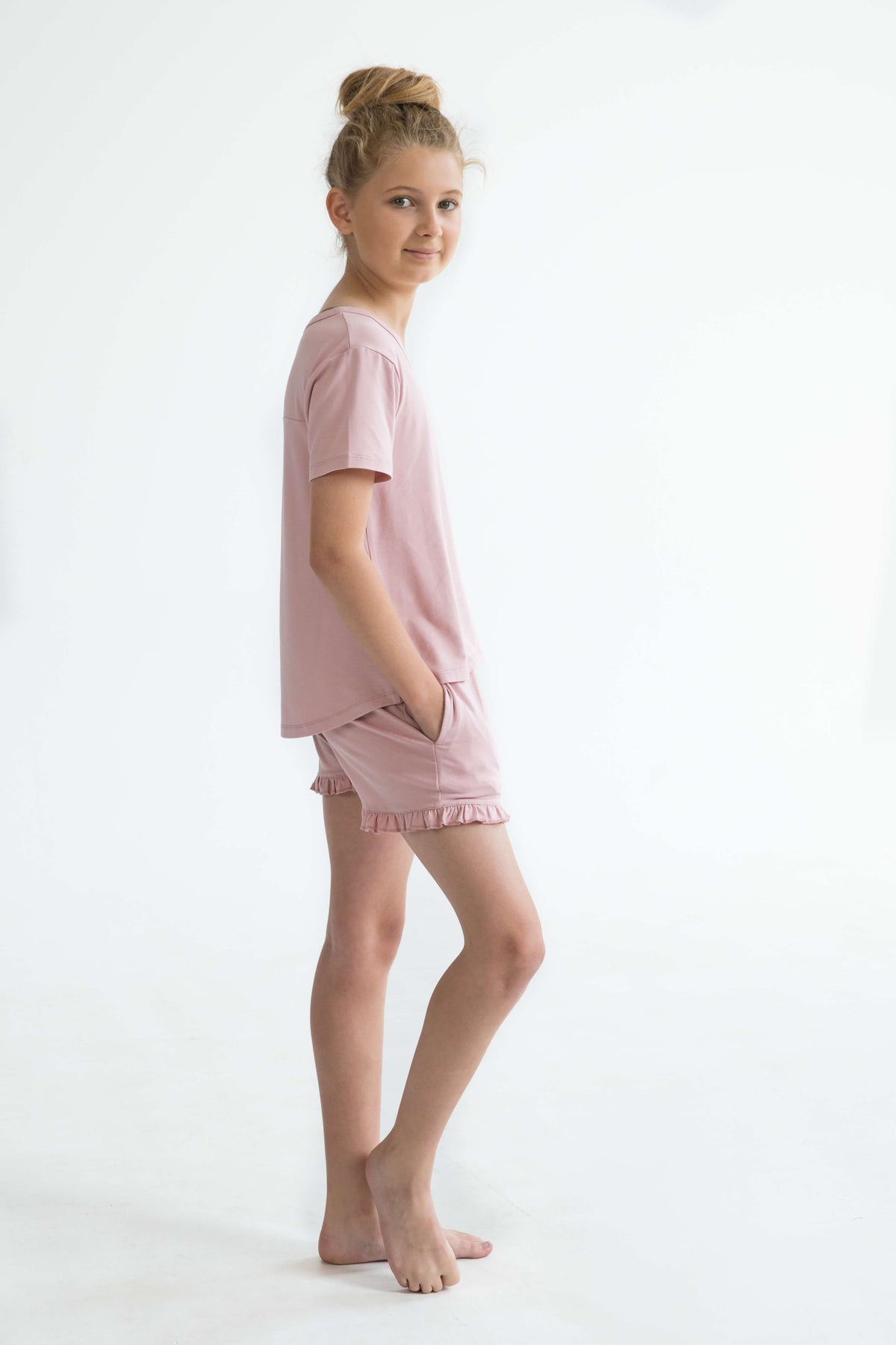 pink teen girls summer pyjamas set shorts with pockets and frill and short sleeve top by Love Haidee Australia side