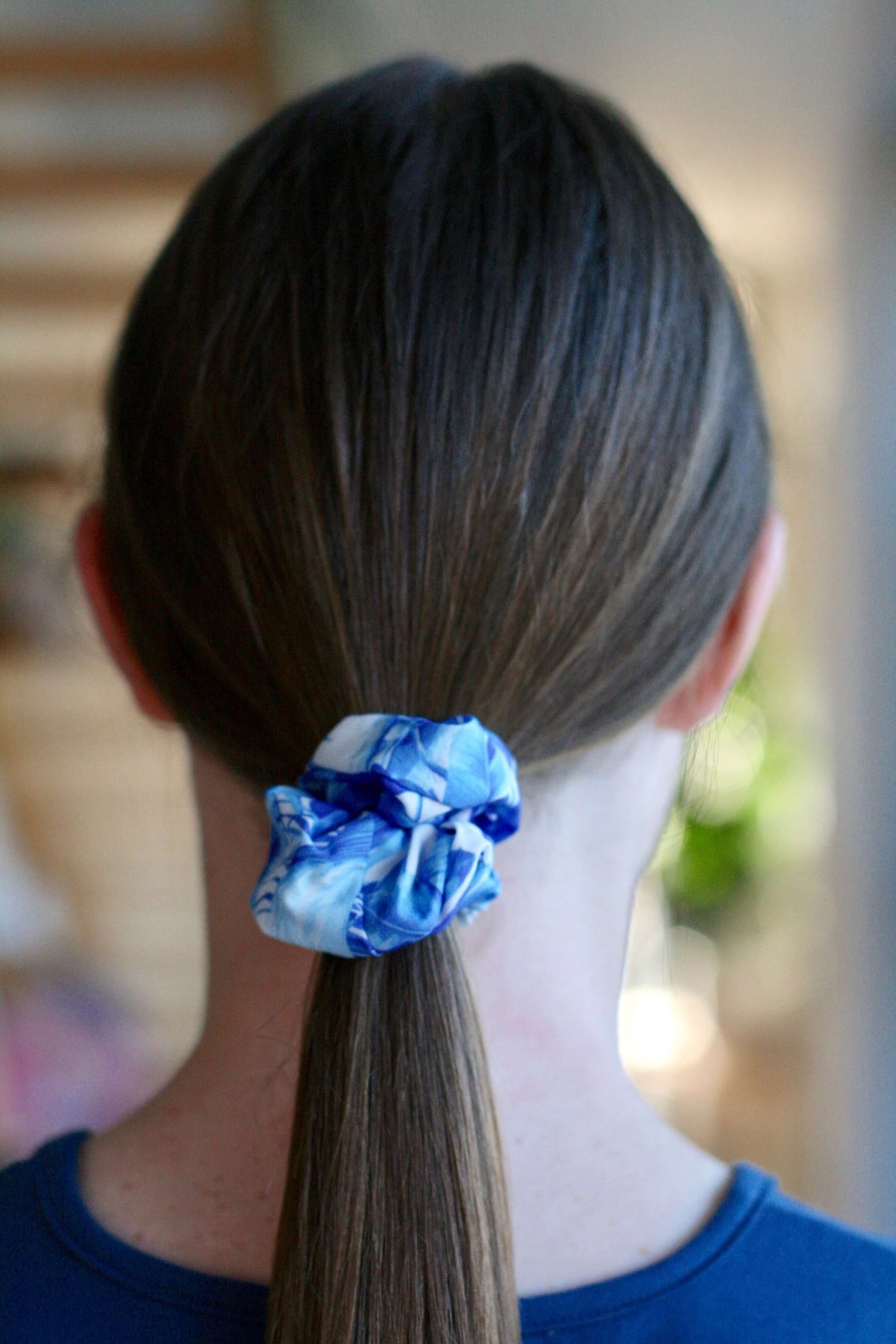 teen girls hair accessories scrunchie by Love Haidee Australia blue tropical floral print in girls hair